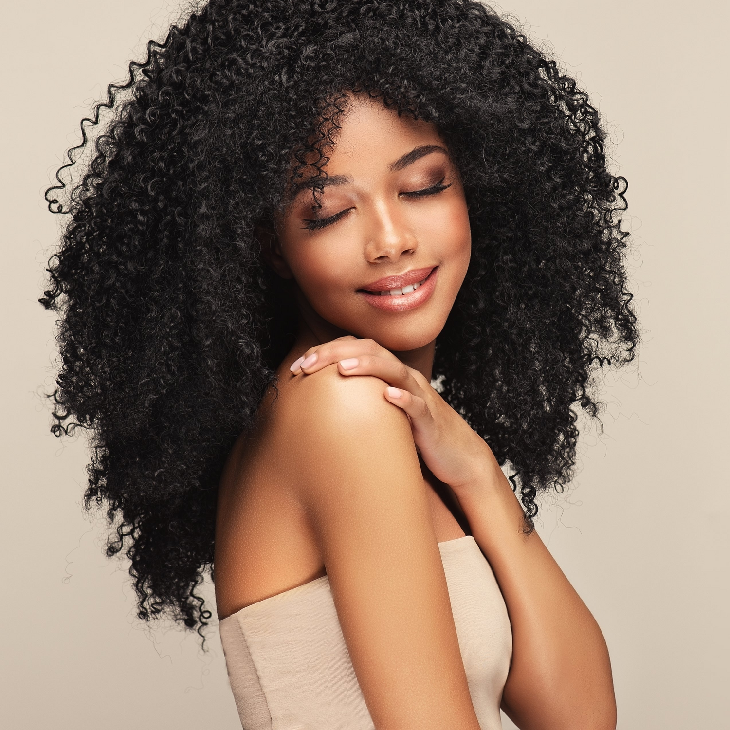 Image of woman wearing the plush curl collection
